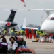 Environmentalists in the Netherlands protest at Amsterdam Schiphol Airport