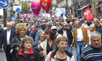 France raises retirement age to 64