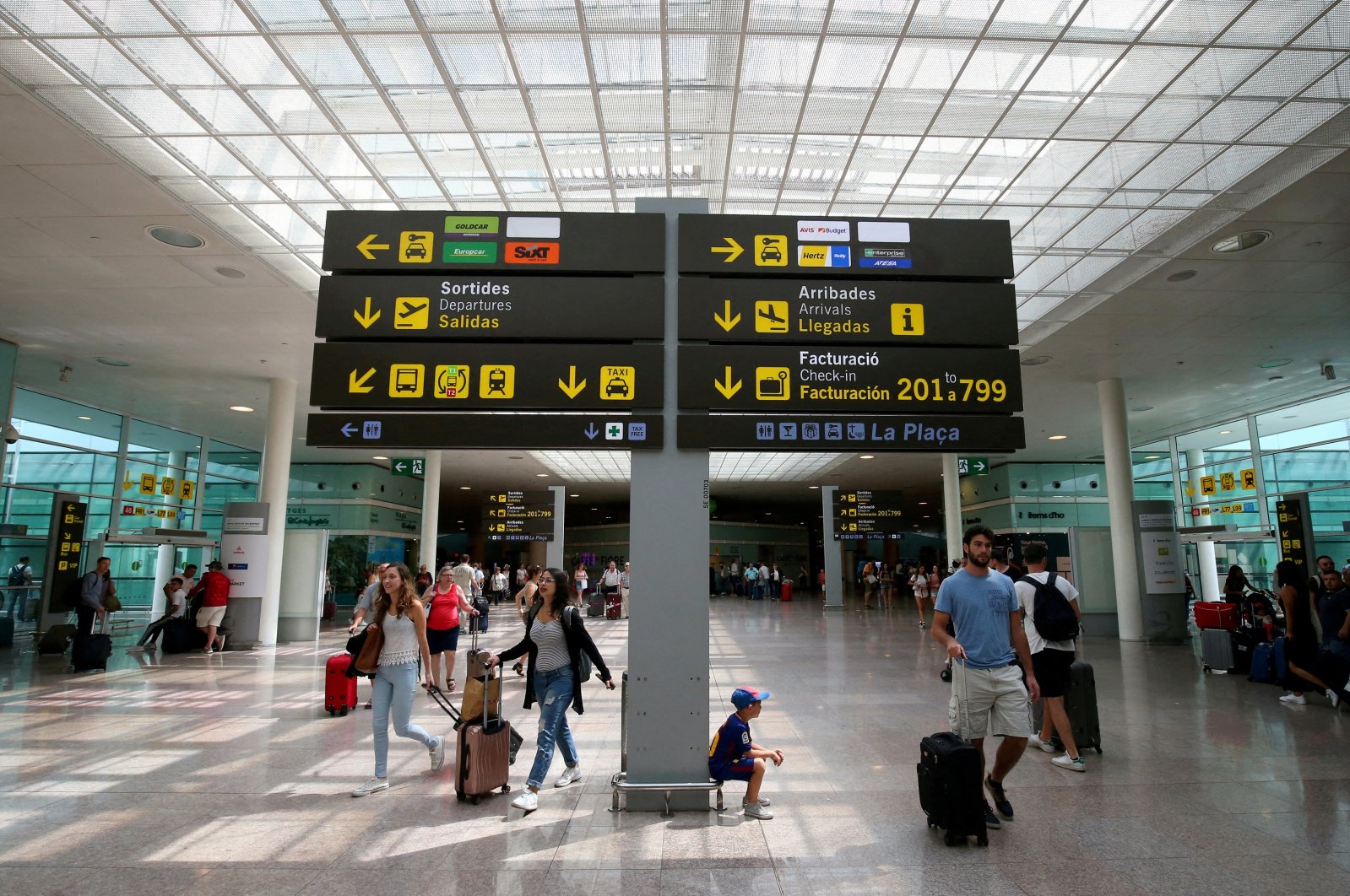 Liquid and electronic device controls are lifted at airports in Spain