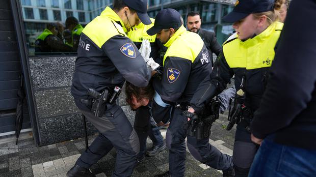 Protesters protesting Macron in Amsterdam detained