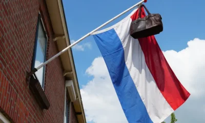 High school graduates in the Netherlands colored the streets with flags and bags