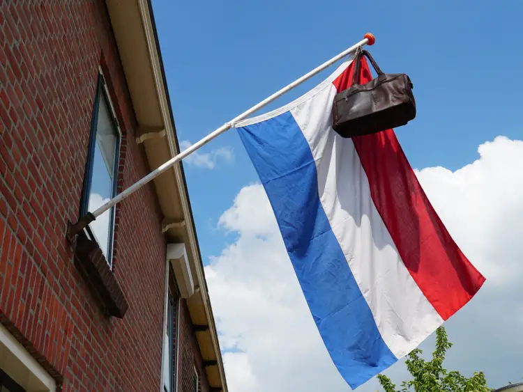 High school graduates in the Netherlands colored the streets with flags and bags