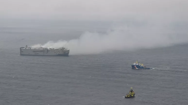 Ship loaded with vehicles burning off the Dutch coast for 2 days raises environmental disaster concerns